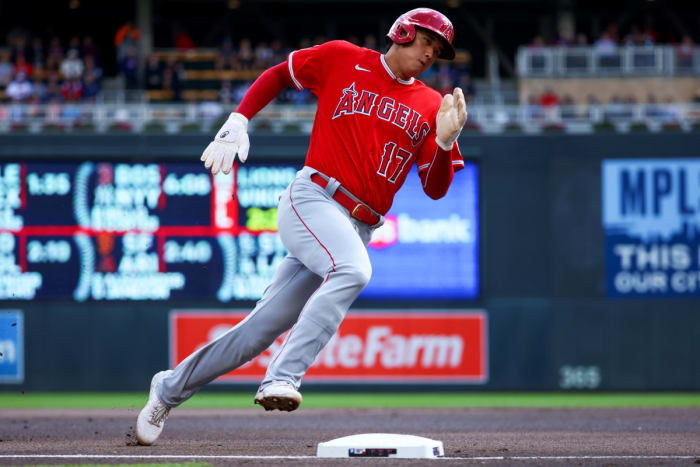 Sep 25, 2022; Minneapolis, Minnesota, USA; Los Angeles Angels designated hitter Shohei Ohtani (17) rounds third base to score against the Minnesota Twins during the first inning at Target Field.